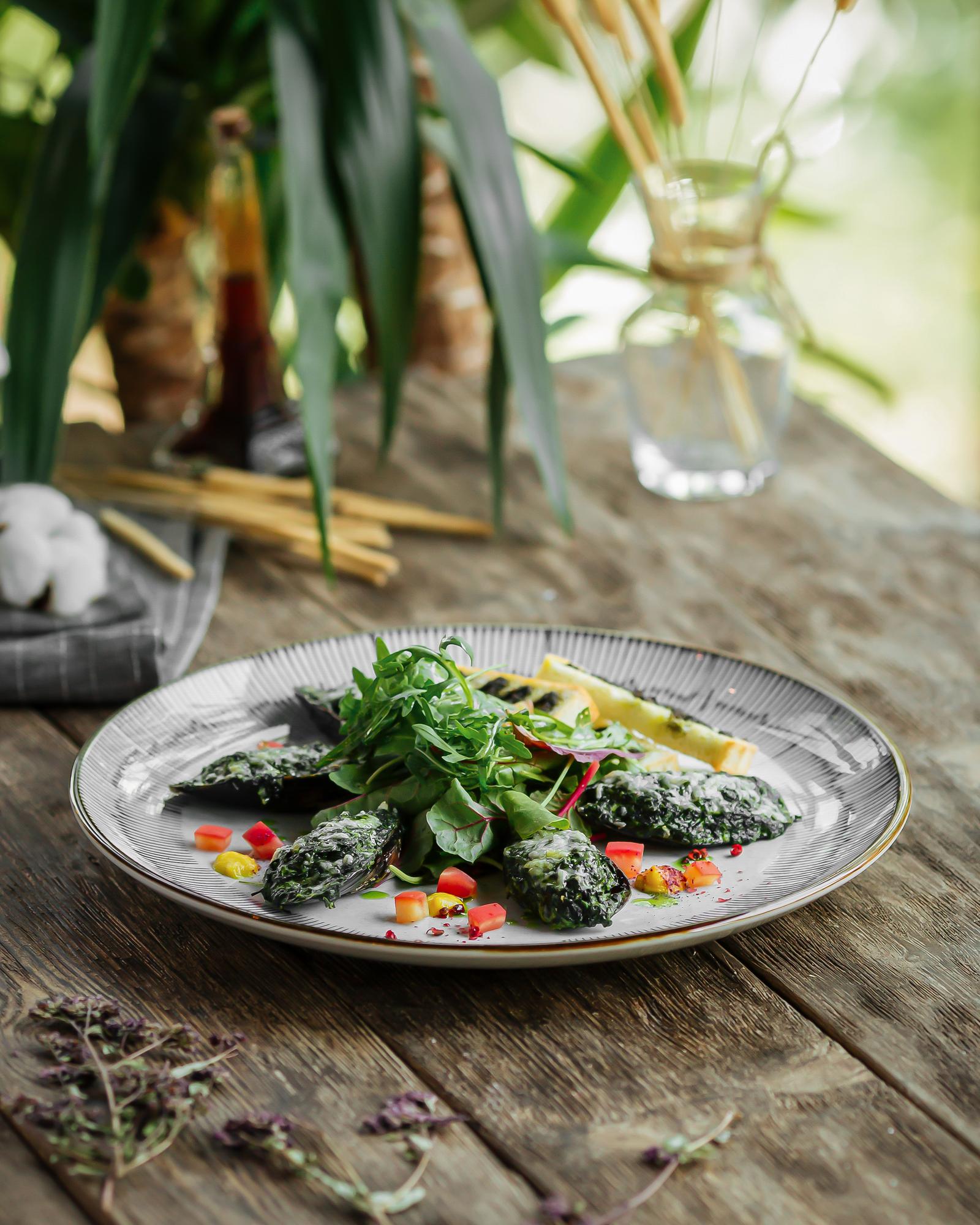 Plated gourmet dish with herbs